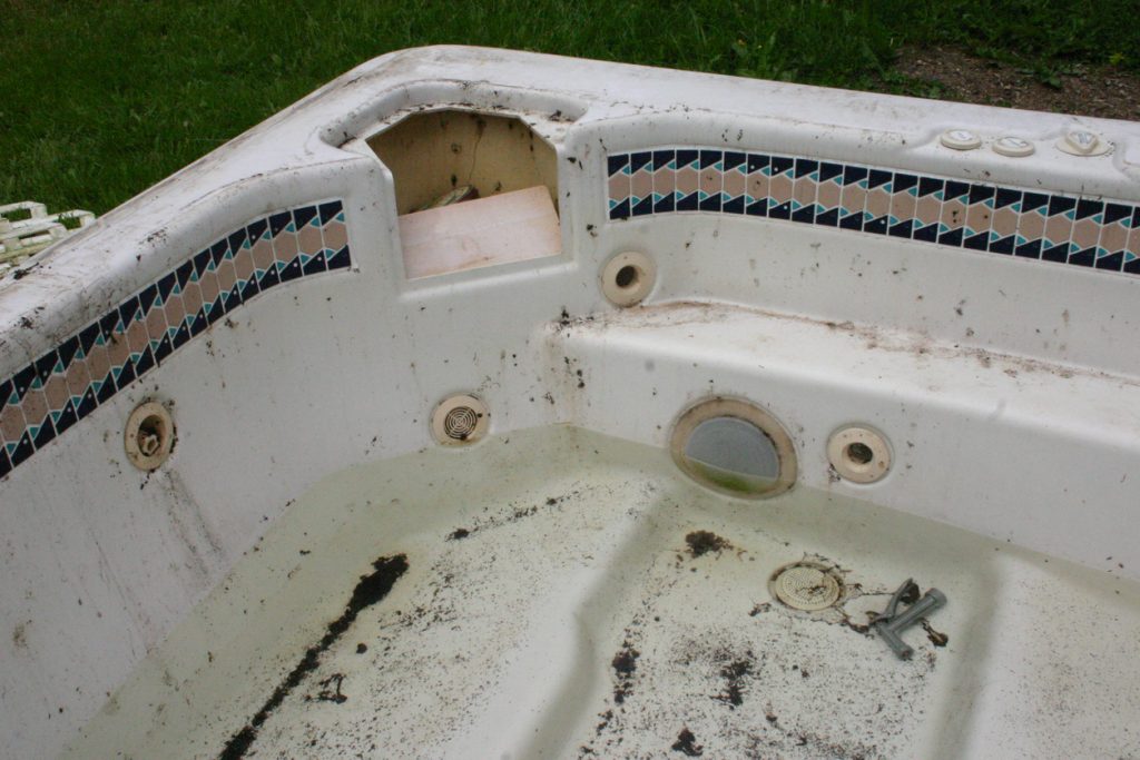 dirty rotten old hot tub 